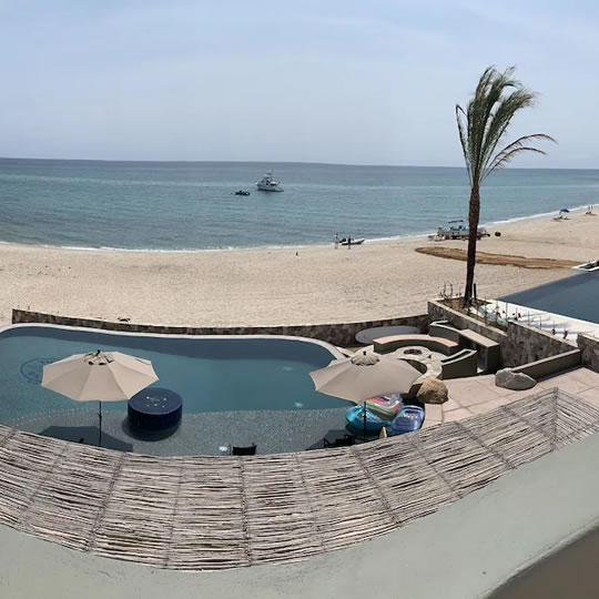 panoramic view of Hacienda Soñadora's pool and beach front